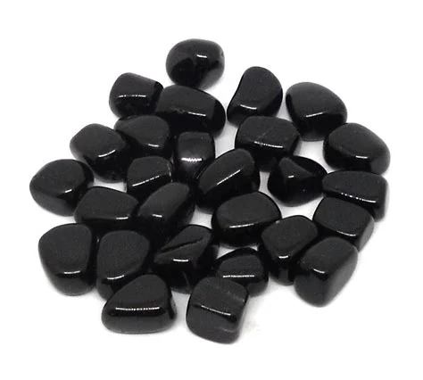 Rodado de ónix natural pulido en tono negro brillante