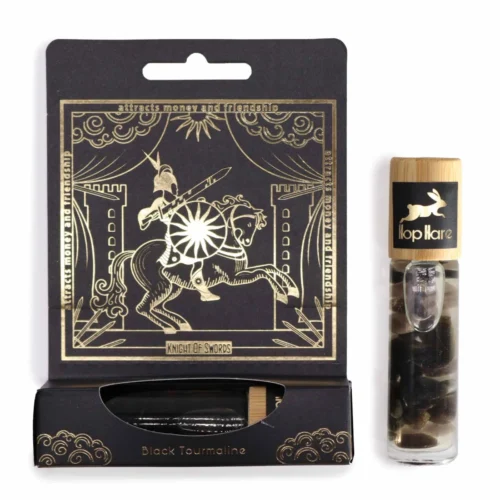 Roll-on turmalina negra Hop Hare con aceite esencial sobre fondo neutro