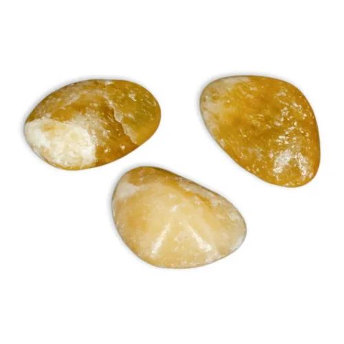 Calcita amarilla rodada, piedra natural pulida de tono cálido
